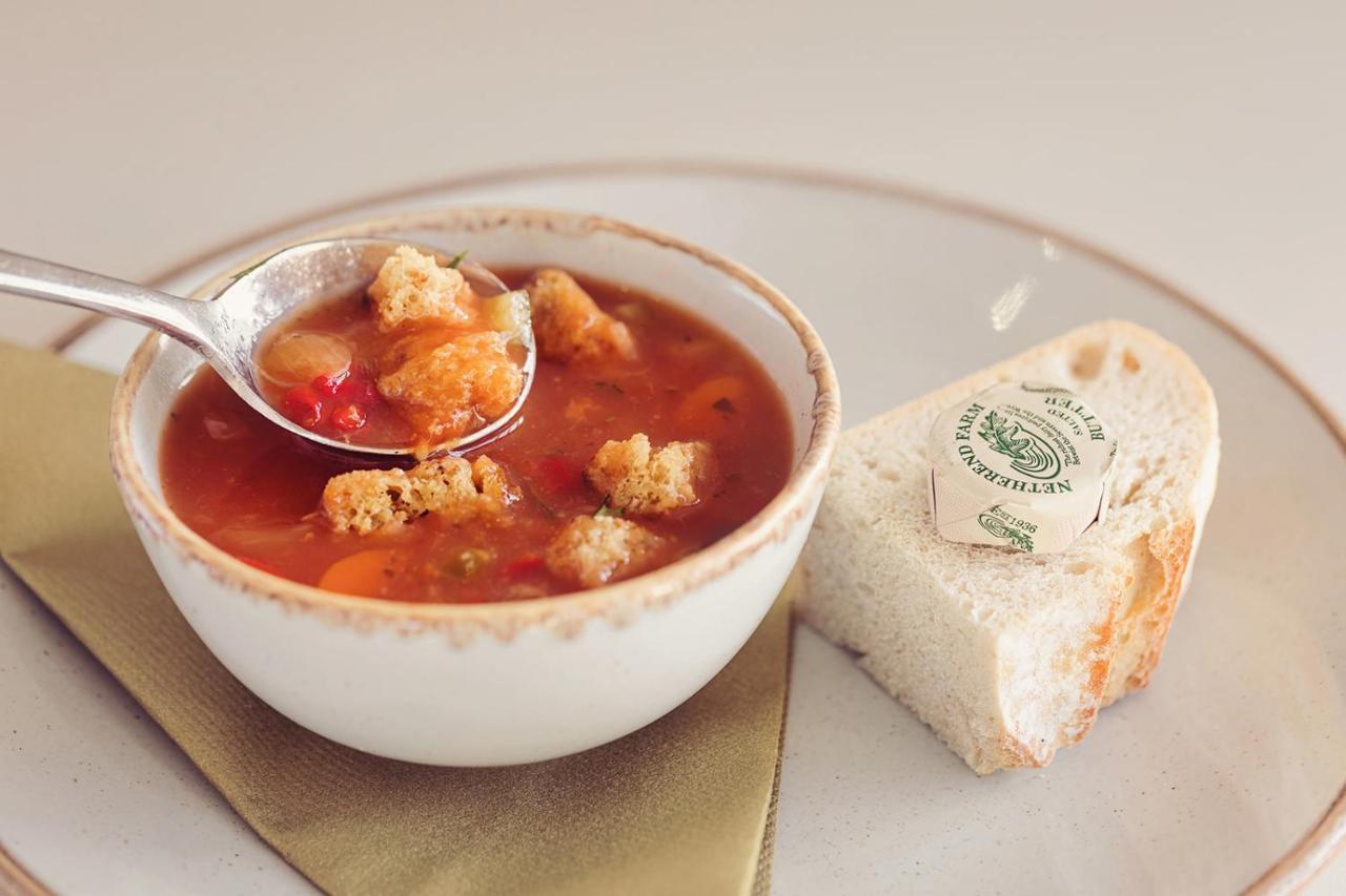 Longlands Inn & Cottages Carnforth Exterior foto A bowl of soup with a bread roll